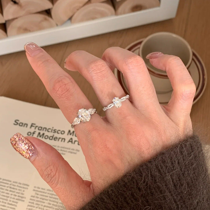 Spiral Big Diamond Oval Female Twist Arm Design Simple Rings