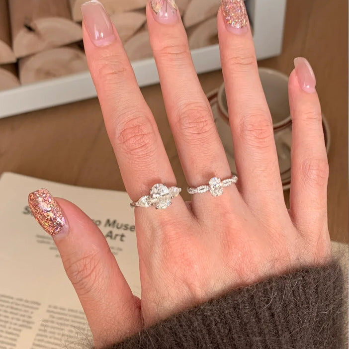 Spiral Big Diamond Oval Female Twist Arm Design Simple Rings