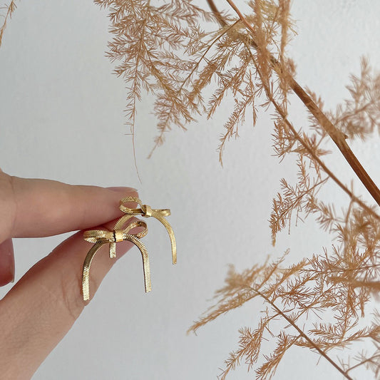 Soft Snake Bone Bow Bandage Ear Earrings