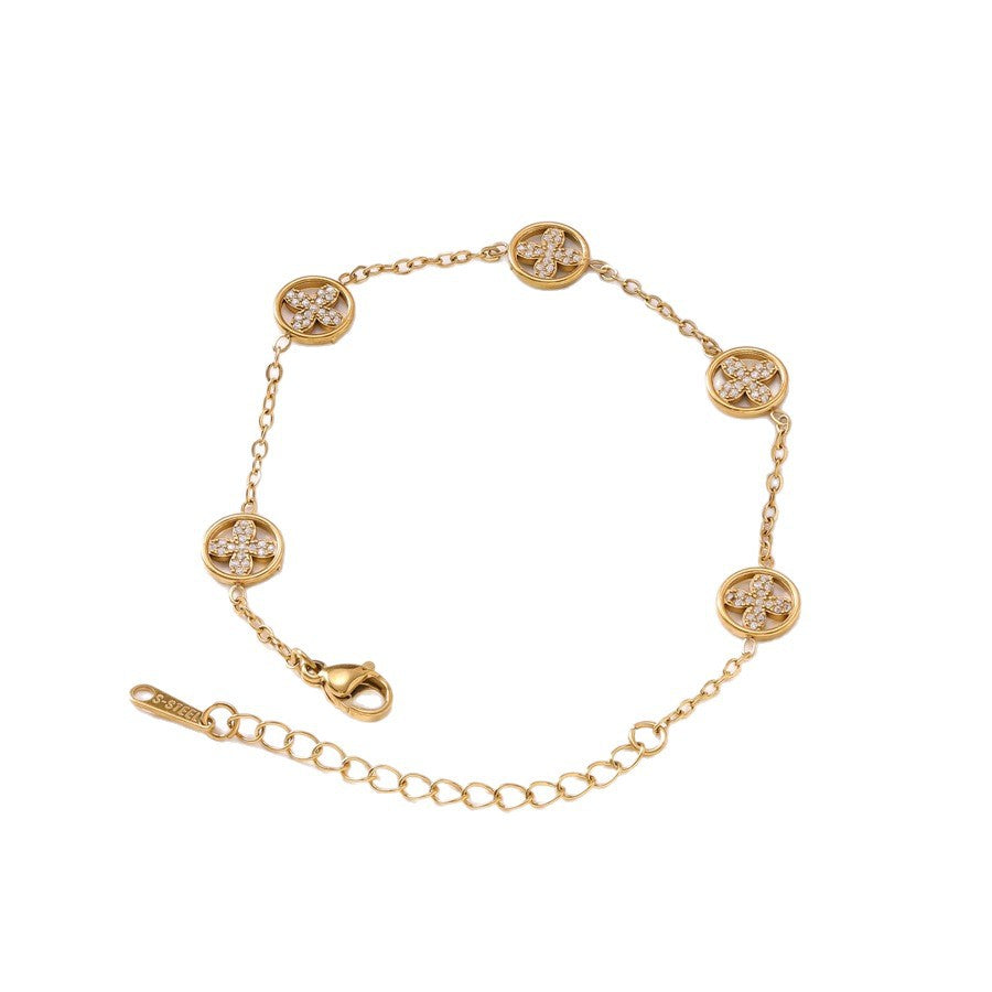 Women's Luxury Diamond Studded Hollow Four-leaf Flower Fashion Vacuum Electroplating Stainless Bracelet