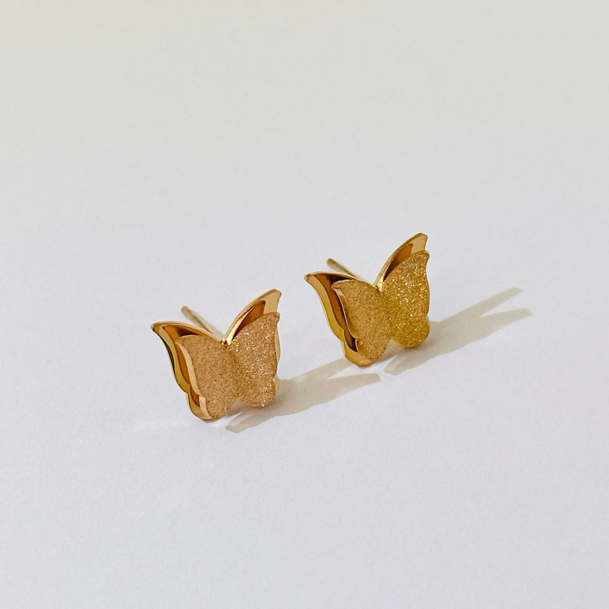 Butterfly Frosted Female Titanium Steel Rose Earrings