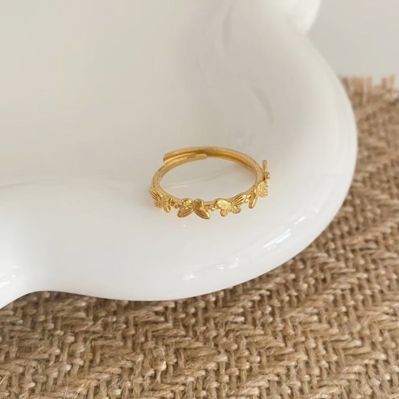 Delicate Pink Flower Butterfly Alluvial Gold Temperamental Minority Rings
