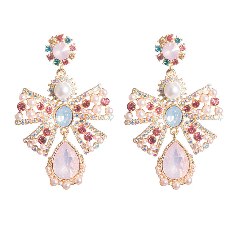 Women's Pink High Profile Fashion Hollow Pearl Earrings