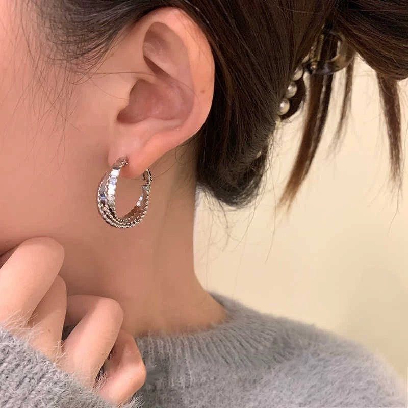 Women's Niche Design Sier Twisted Hoop Light Earrings