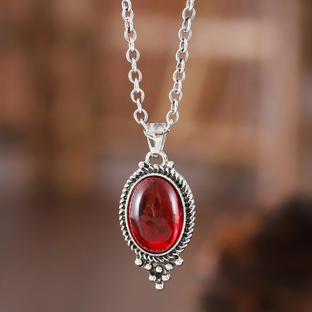 Retro Exquisite Embossed Inlaid Ruby Oval Earrings
