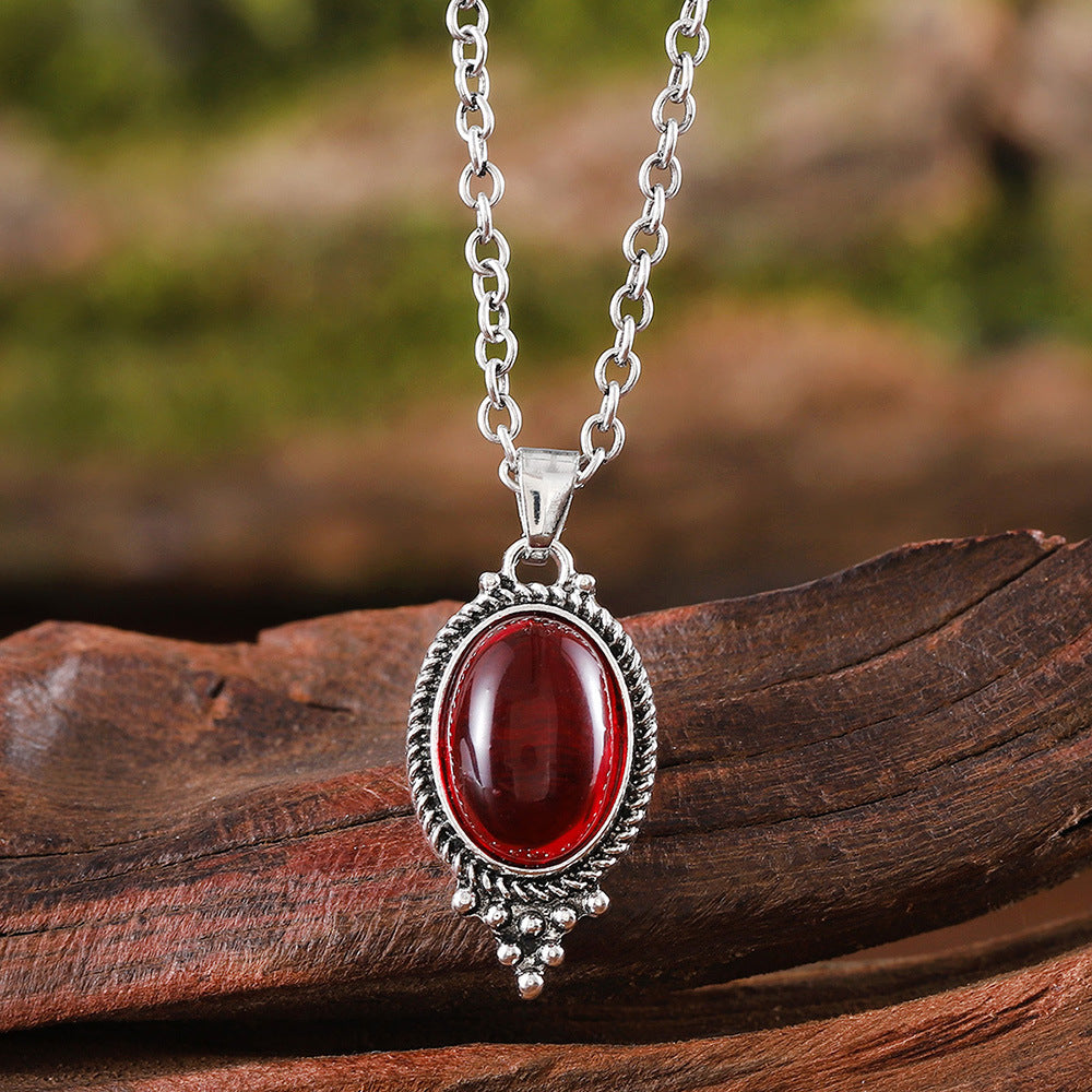 Retro Exquisite Embossed Inlaid Ruby Oval Earrings