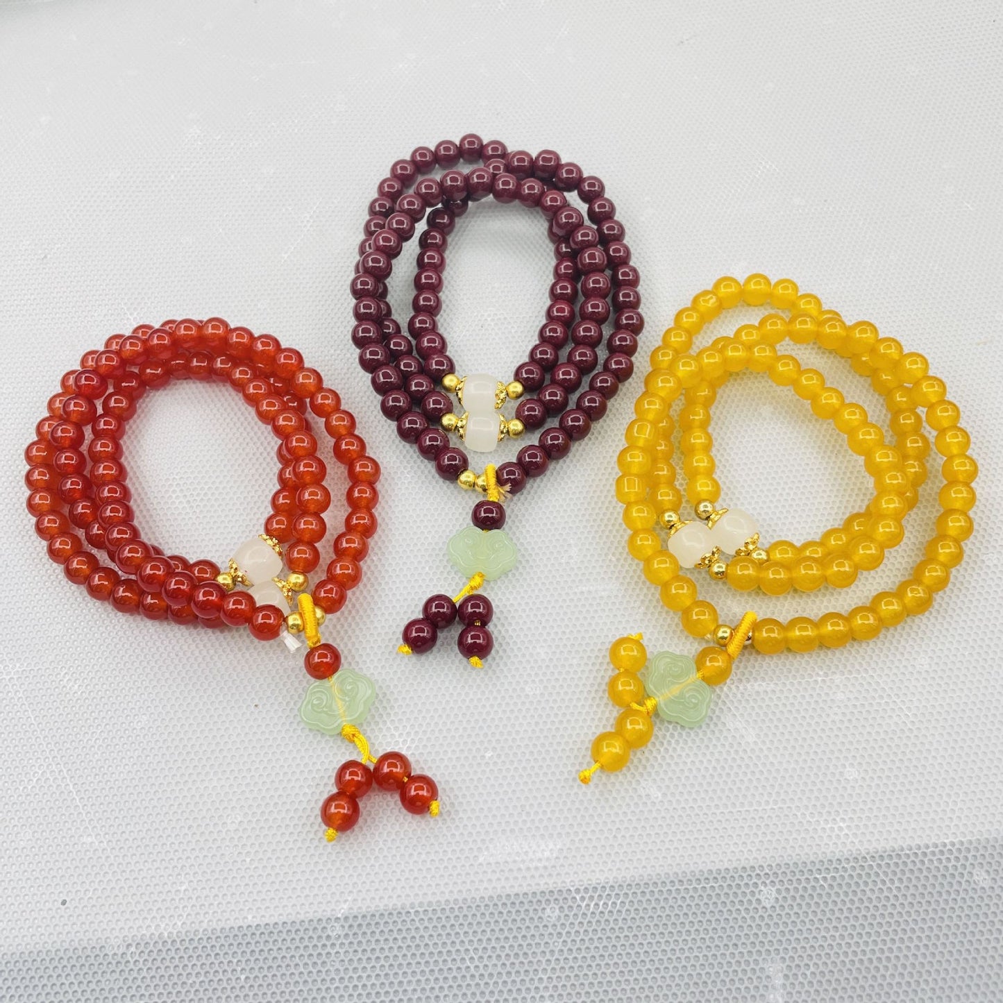 Women's Imitation Purple Gold Cinnabar Three Buddha Head Bracelets