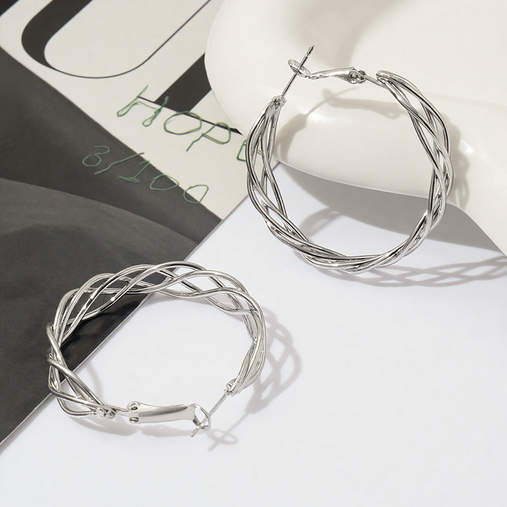 Retro Hollow Twist Hoop Special Interest Light Earrings
