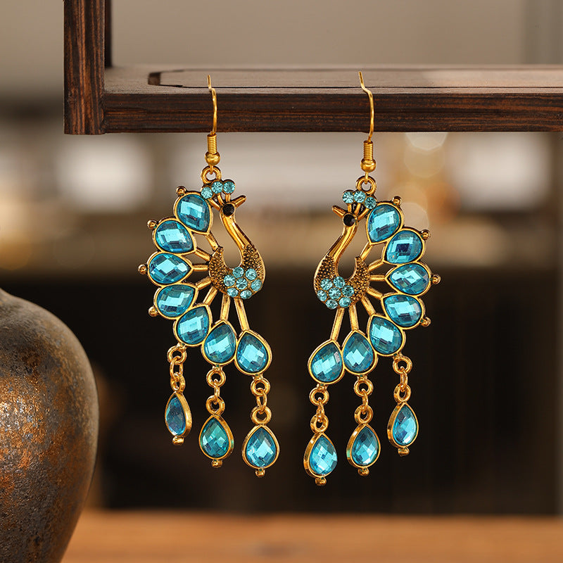 Retro Peacock Ethnic Style Hollow Personalized Dark Green Diamond Metal Earrings
