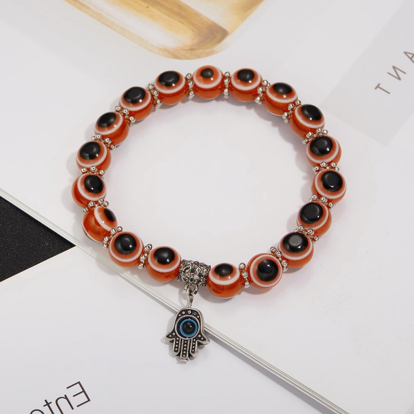 Alloy Palm Hollow Blue Eyes Beaded Elastic Bracelet