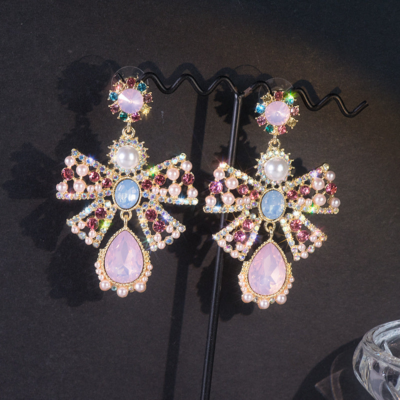 Women's Pink High Profile Fashion Hollow Pearl Earrings