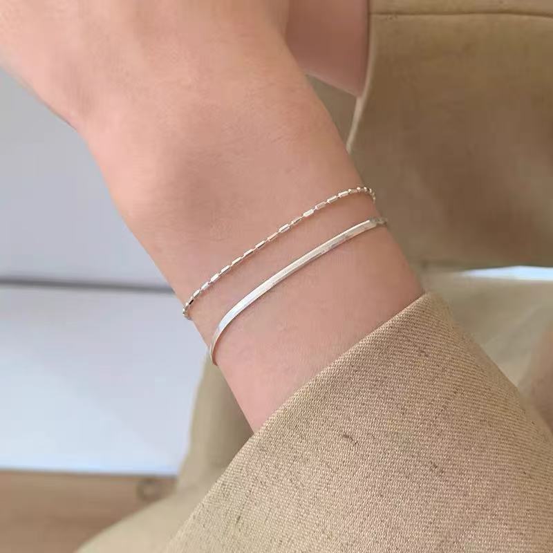 Women's Exquisite Sterling Sier Snake Bones Chain Ball Stitching Asymmetric Light Bracelet