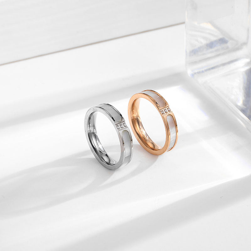 Three Diamond White Shell Titanium Steel Female Niche Style Rings
