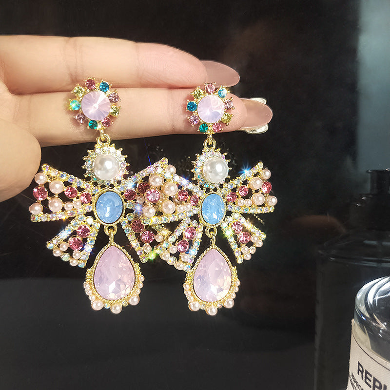 Women's Pink High Profile Fashion Hollow Pearl Earrings