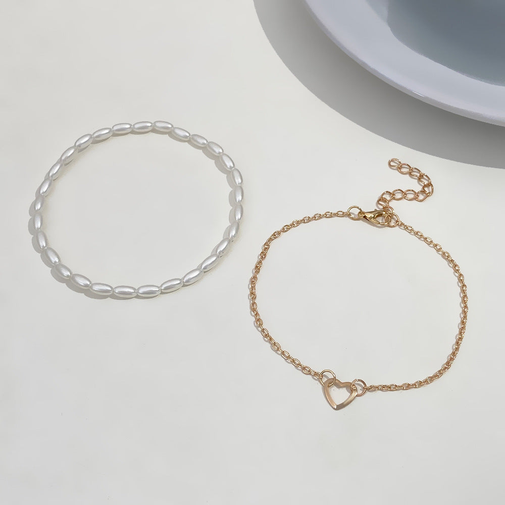 Women's Fashion Pearl Imitation Hollow Heart Simple Bracelet