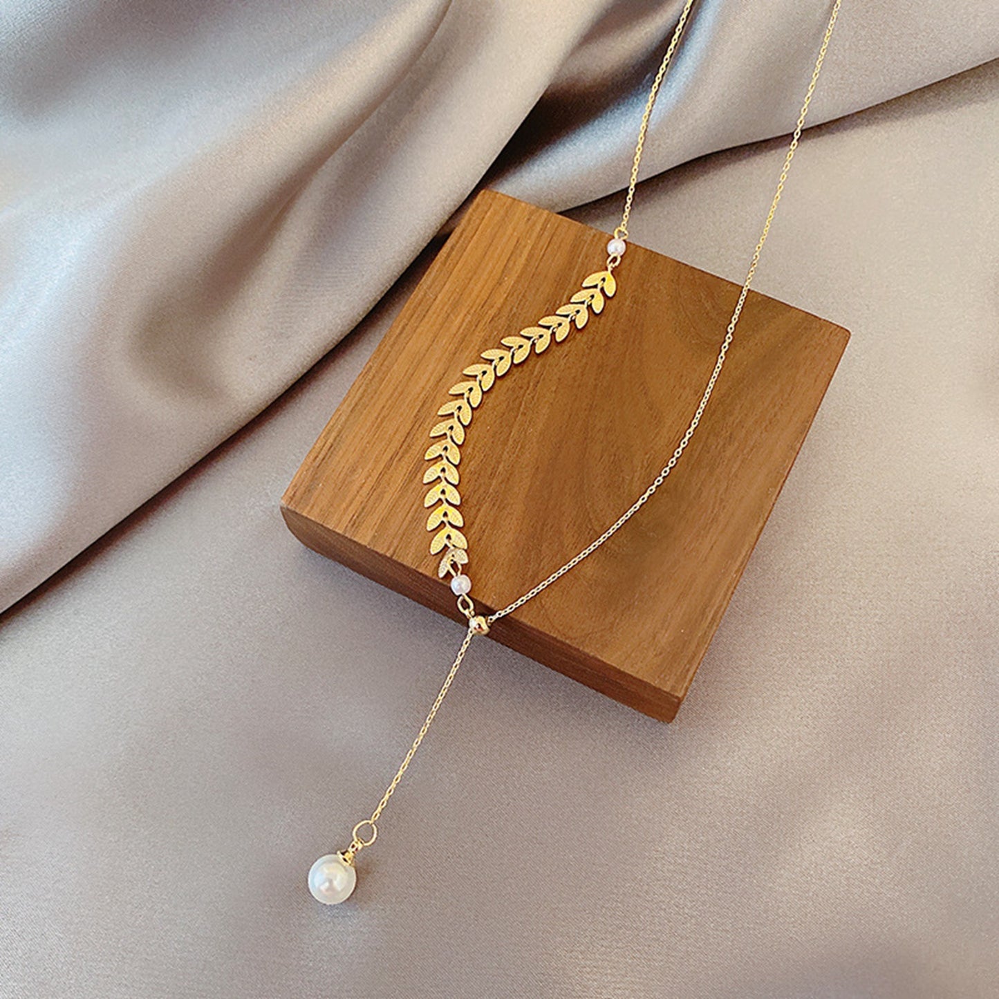 Steel Three-piece Set Niche Design Wheat Pearl Necklaces