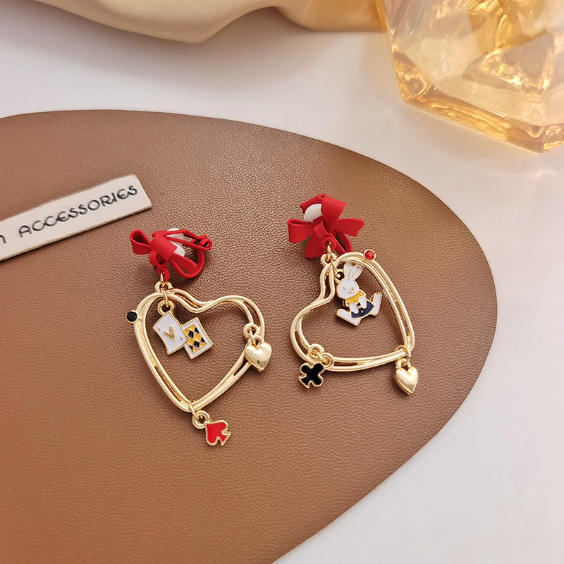 Women's Needle Hollow Heart Asymmetric Bow Style Earrings