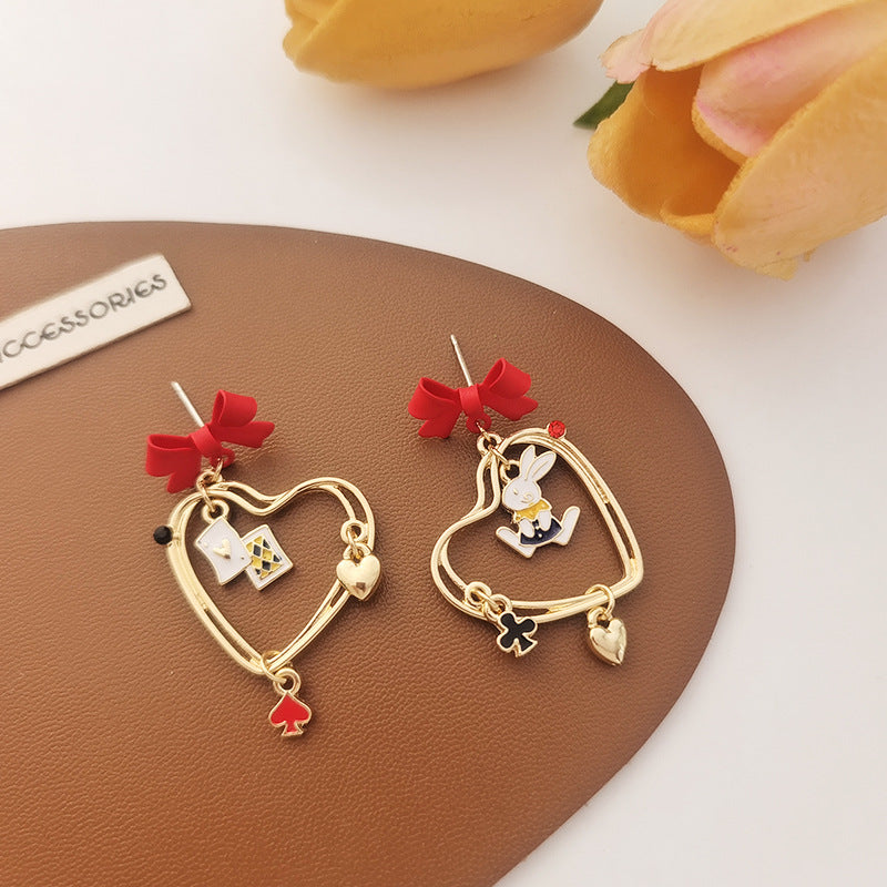 Women's Needle Hollow Heart Asymmetric Bow Style Earrings