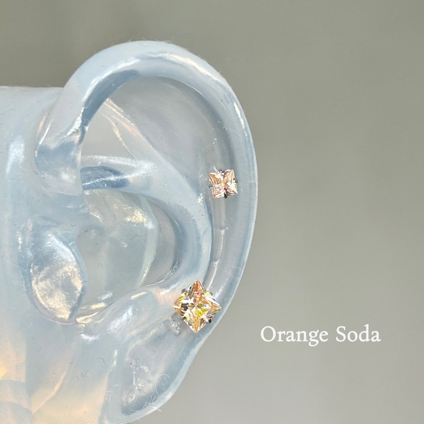 Women's Orange Square Titanium Alloy Internal Spiral Ear Stud Earrings