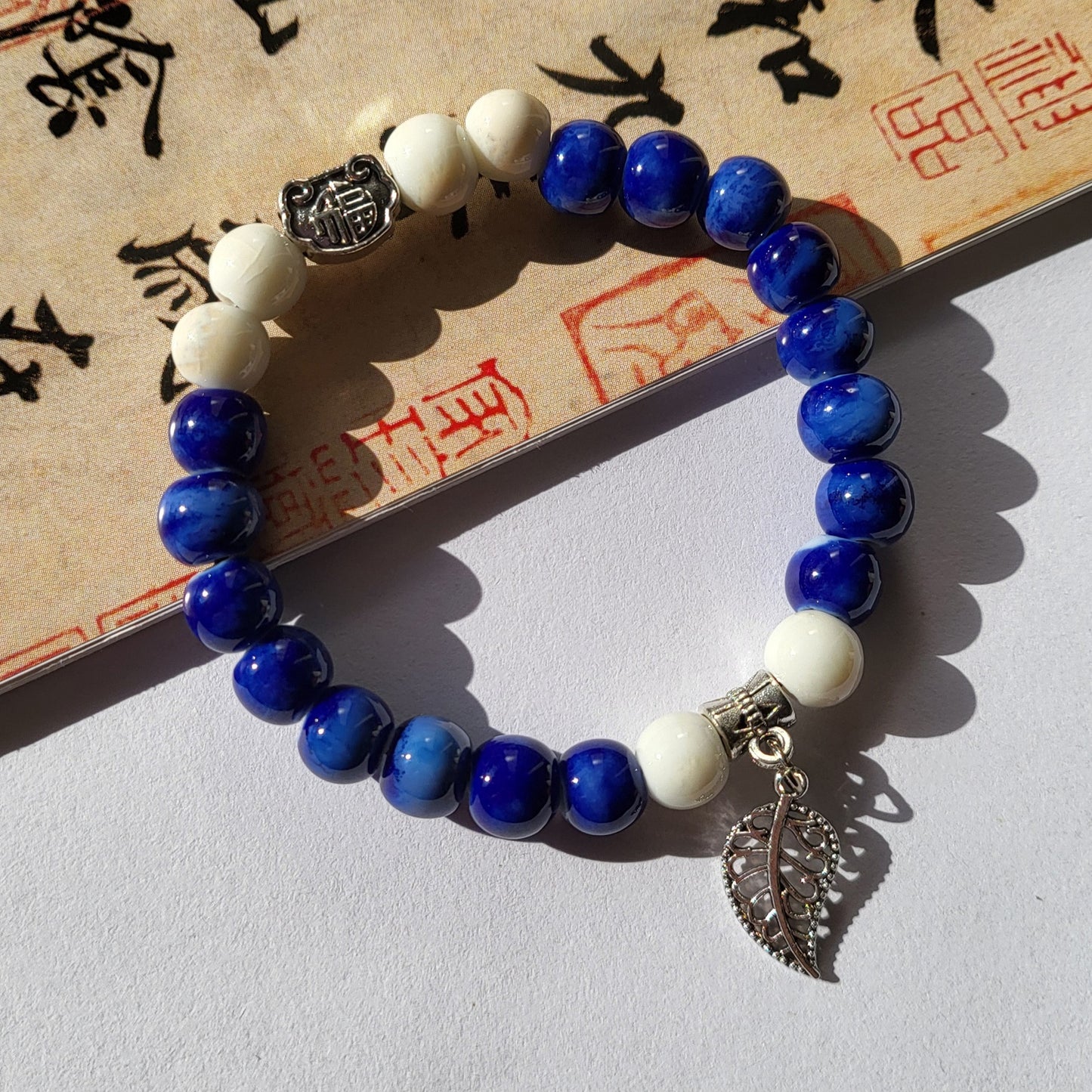 Ten Yuan Three String Hot Ceramic Porcelain Rose Beads Handmade Bracelet
