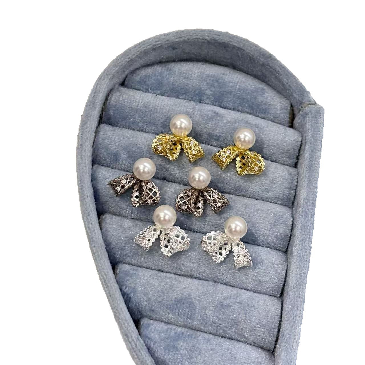 Hollow Bow Pearl Female Fashion High Sense Bud Stud Earrings
