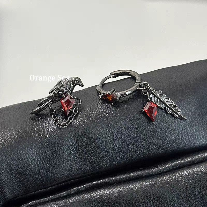 Crow Black Ear Bone Titanium Steel Screw Red Zircon Rings