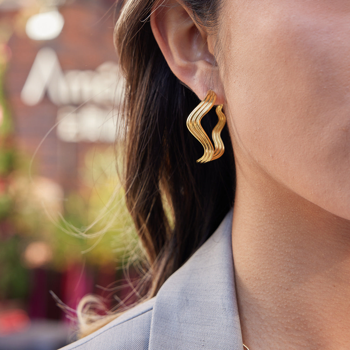Gold Stainless Steel Wave Simple High-grade Stud Earrings