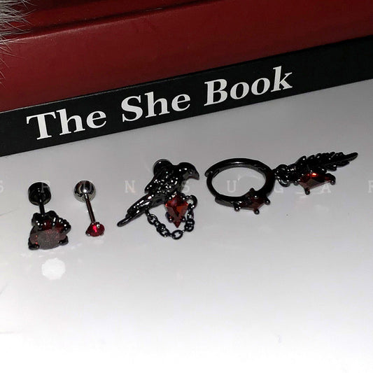 Crow Black Ear Bone Titanium Steel Screw Red Zircon Rings