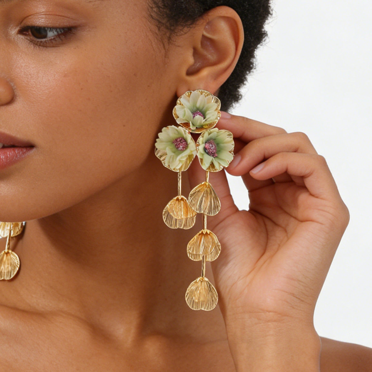 Women's Fashion Metal Hollow Floral Tassel Fresh Earrings