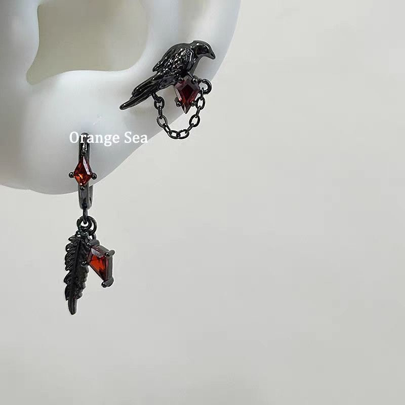 Crow Black Ear Bone Titanium Steel Screw Red Zircon Rings