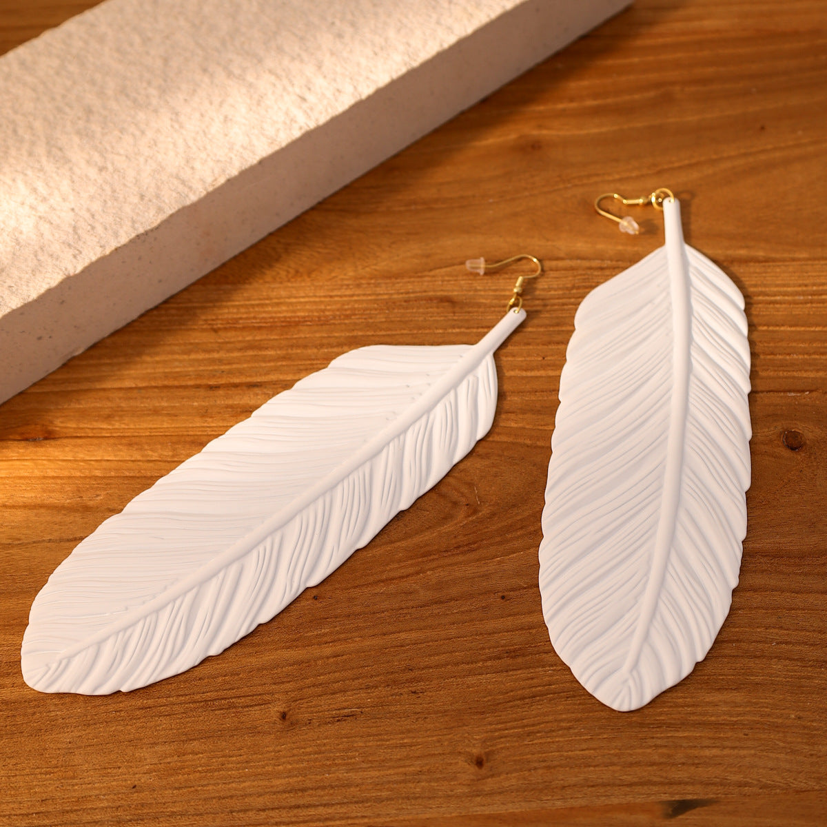 Exaggerated Long Metal Feather Textured Niche Earrings