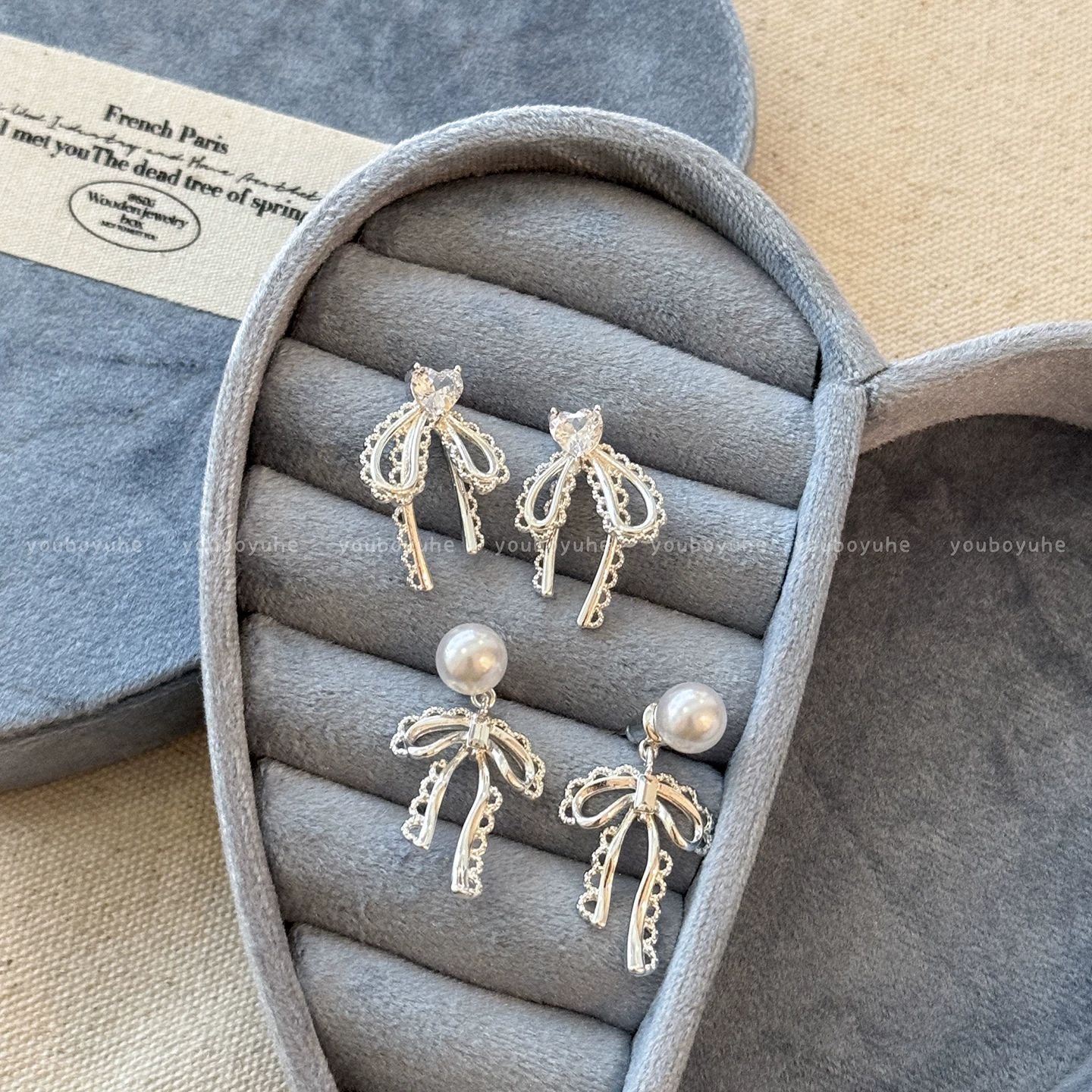 Women's Bow Pearl Light Luxury High-grade Niche Delicate Earrings