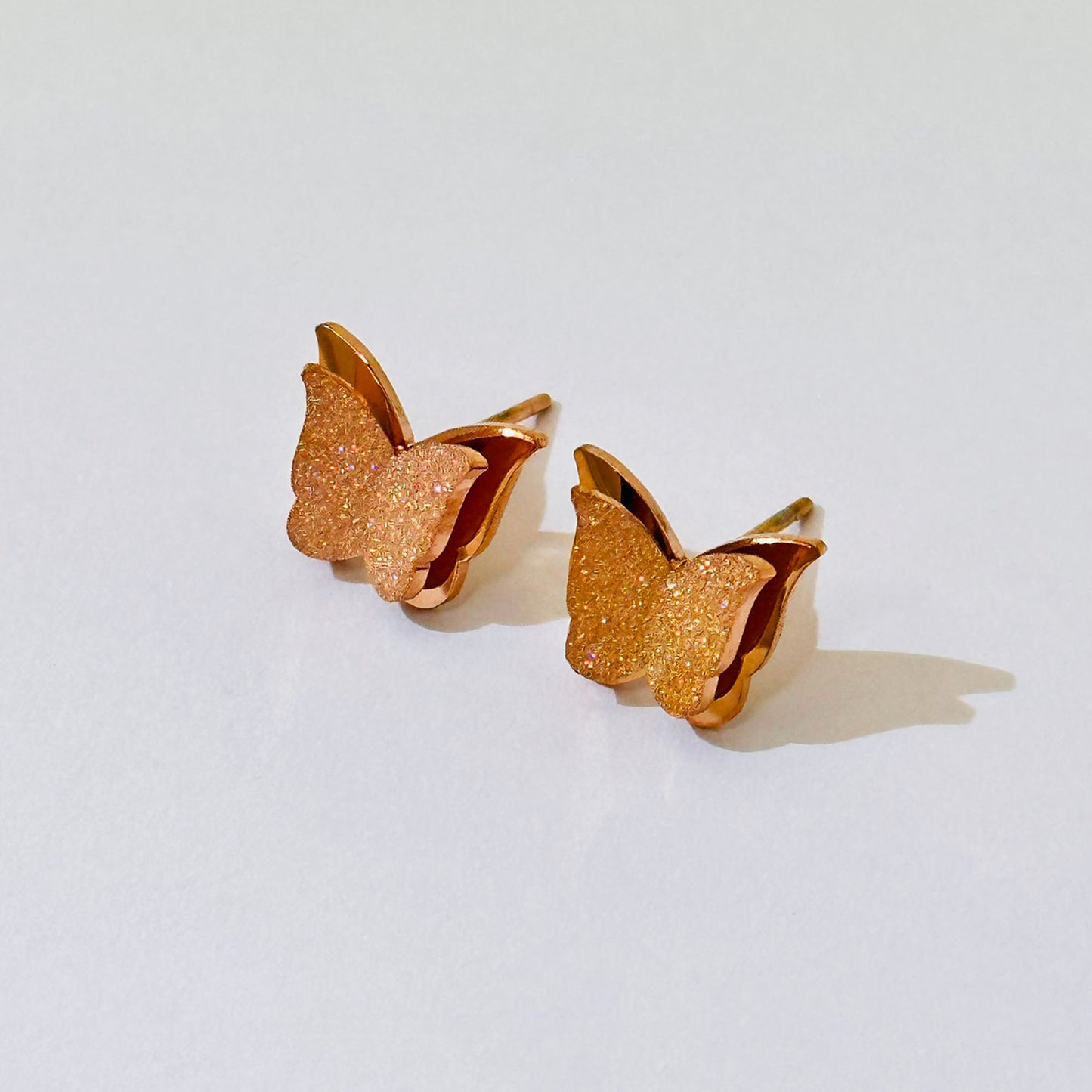 Butterfly Frosted Female Titanium Steel Rose Earrings