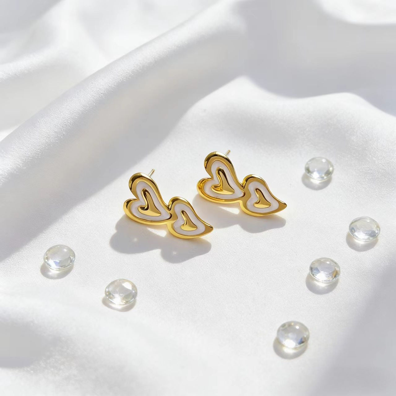 Women's Sweet Double Heart Dripping Niche Design Golden Commuting Elegant Stud Earrings