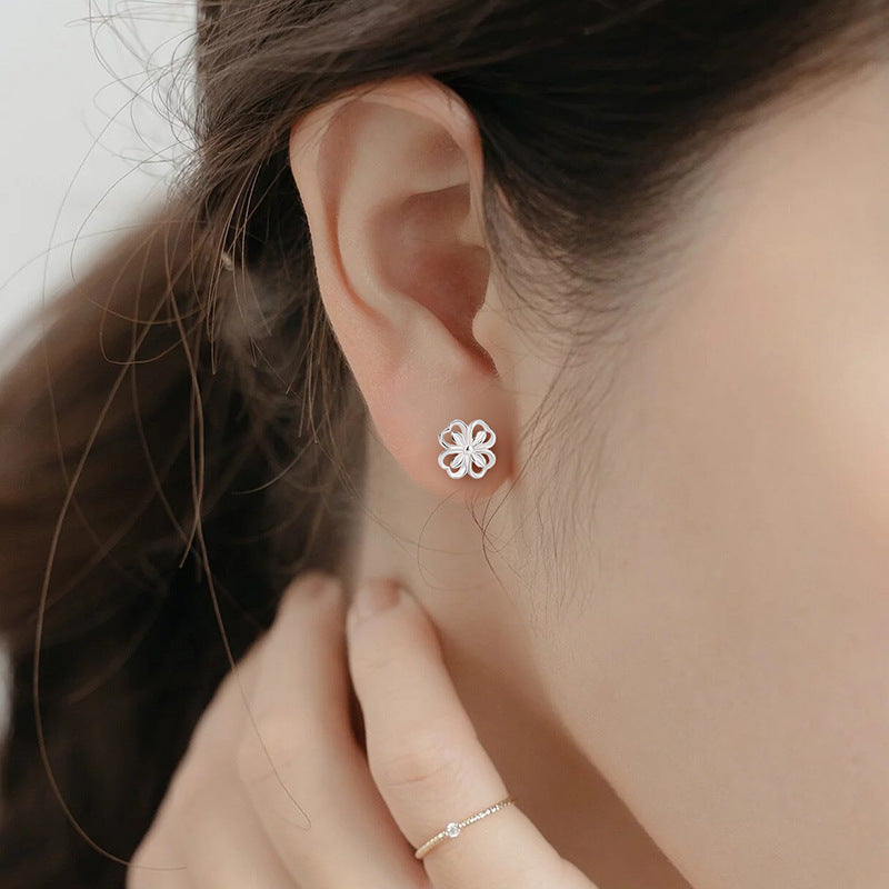 Women's Leaf Clover Ear Mori Style Fresh Hollow Flower Screw Twist Earrings