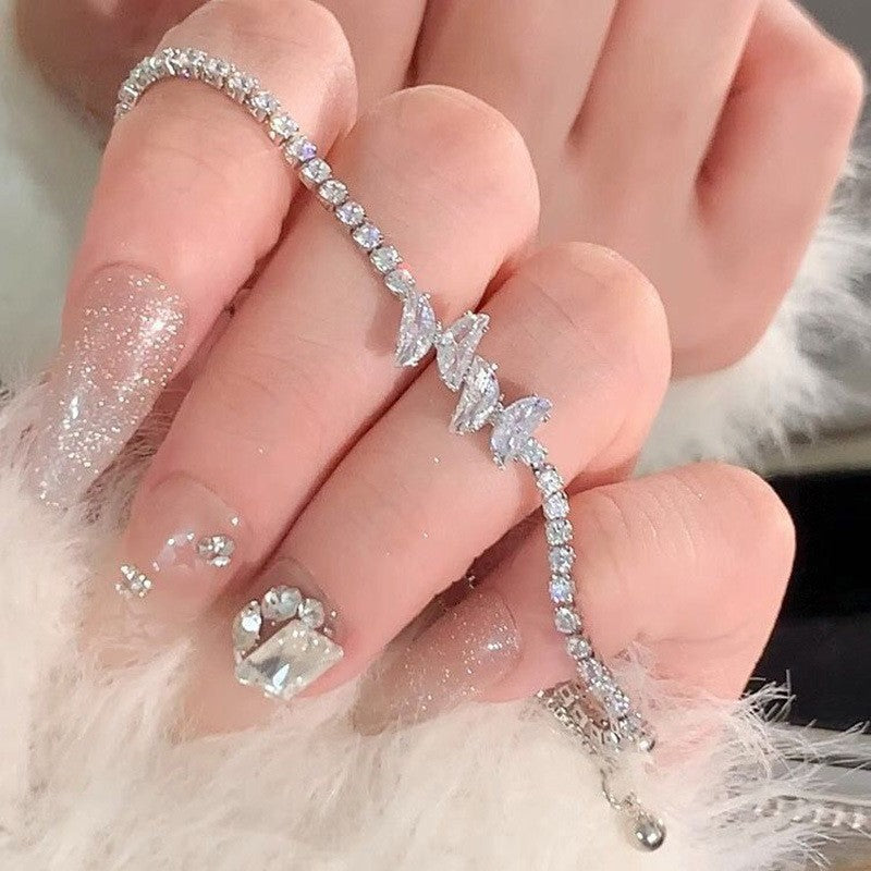 Women's Exquisite Sterling Sier Snake Bones Chain Ball Stitching Asymmetric Light Bracelet