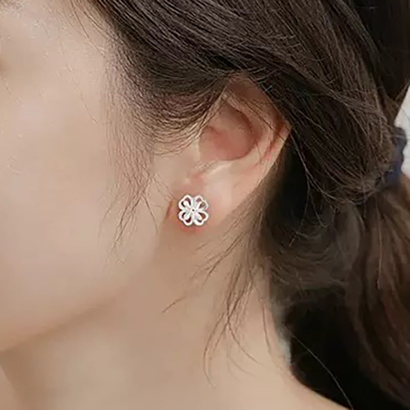 Women's Leaf Clover Ear Mori Style Fresh Hollow Flower Screw Twist Earrings
