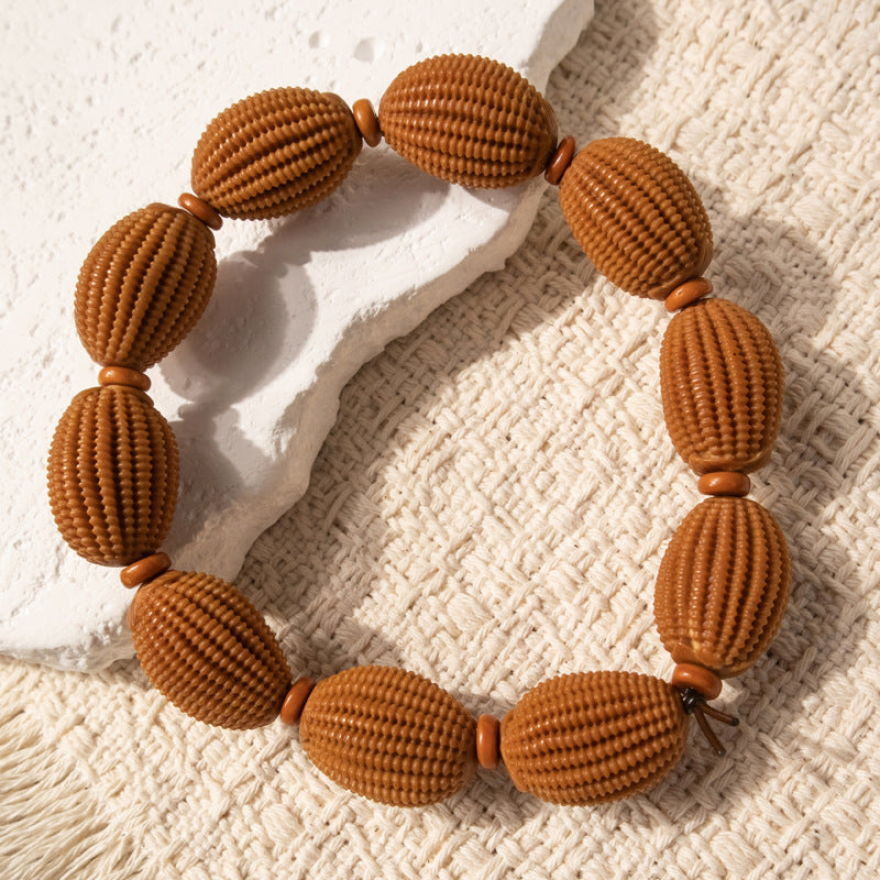 Direction Olive Nut God Of Stone Carving Mermaid Bracelet