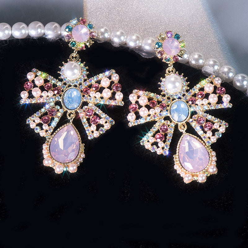 Women's Pink High Profile Fashion Hollow Pearl Earrings