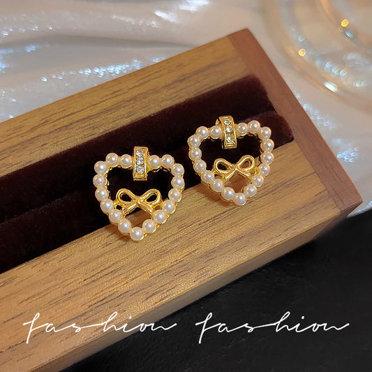 Sier Needle Hollow Love Heart Bow Tie Pearl Lady Joker Earrings