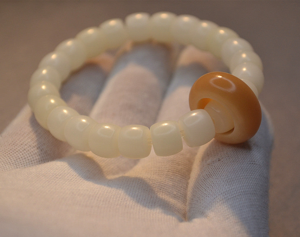 Straight Cut Barrel Beads White Corypha Weathered Bodhi Flexible Bracelet