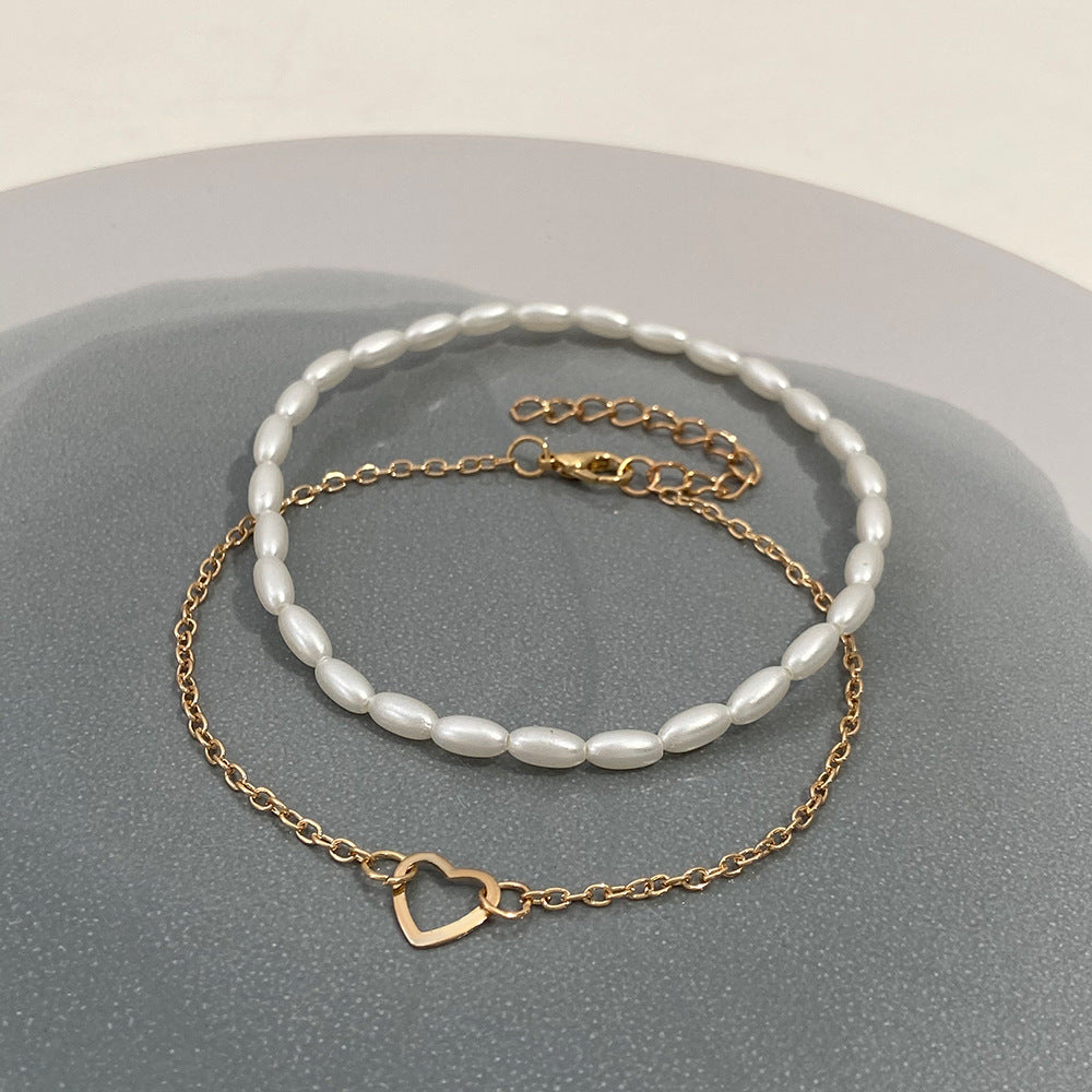 Women's Fashion Pearl Imitation Hollow Heart Simple Bracelet