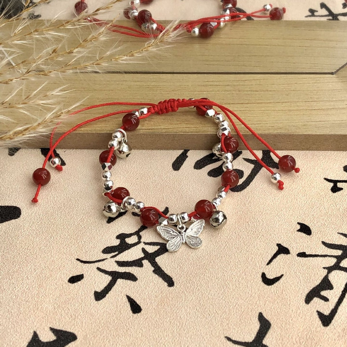 Red Agate Sier Butterfly Bell Female Rope Braid Good Luck Bracelet
