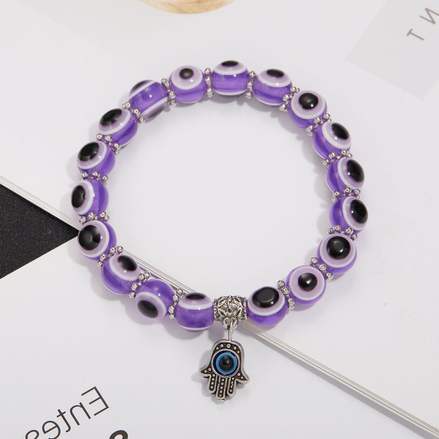 Alloy Palm Hollow Blue Eyes Beaded Elastic Bracelet