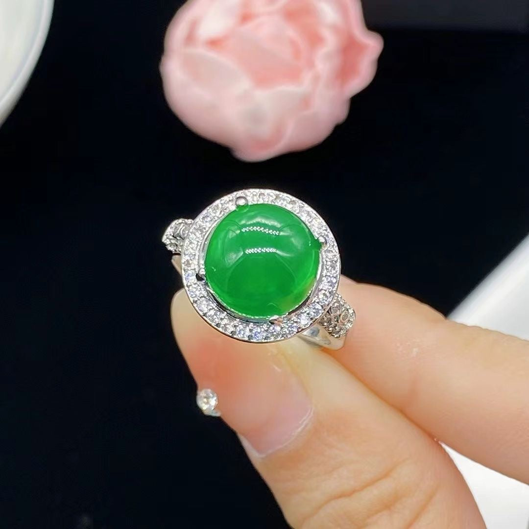 Natural Icy Positive Green Emerald Egg Surface Four Claws Inlaid Ring