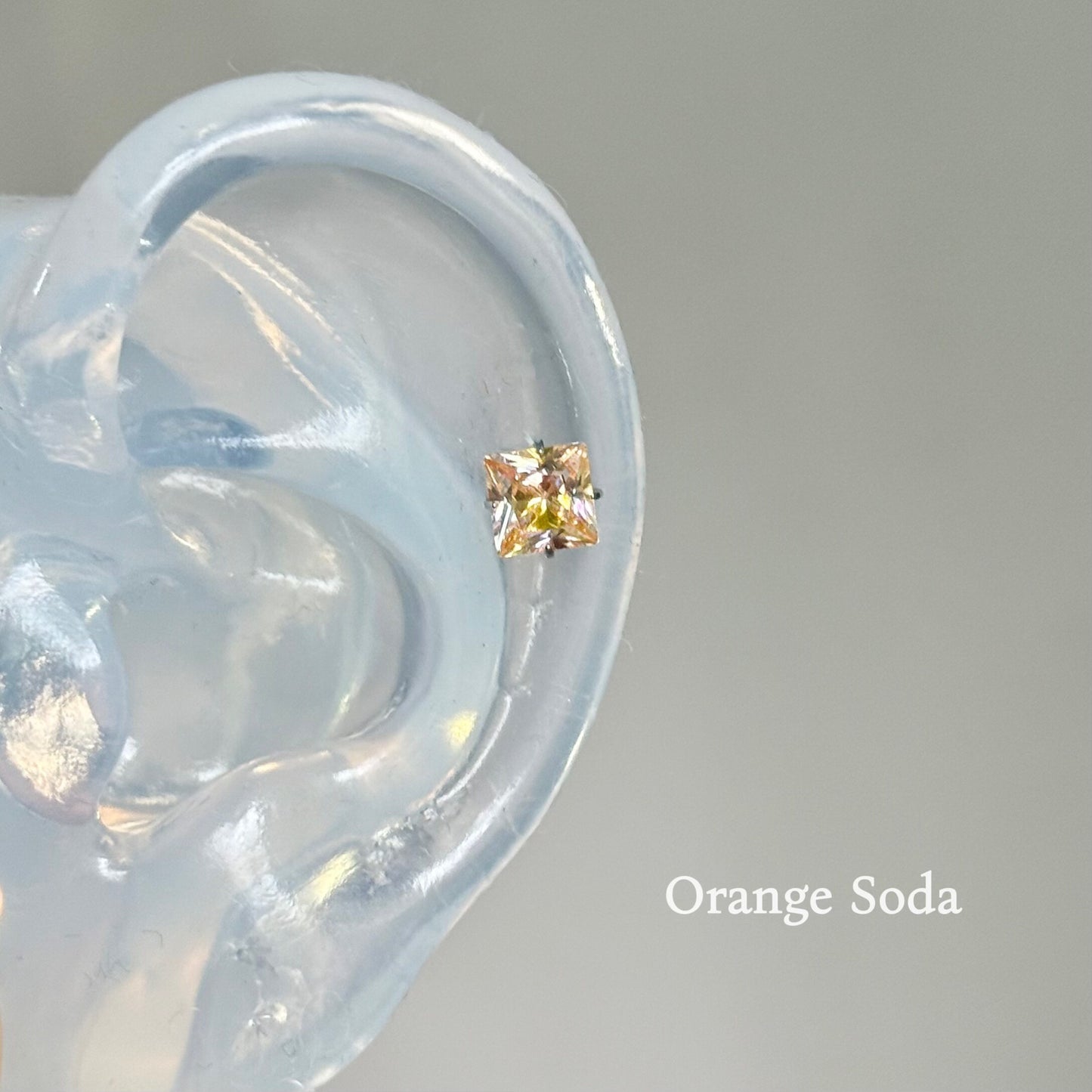 Women's Orange Square Titanium Alloy Internal Spiral Ear Stud Earrings