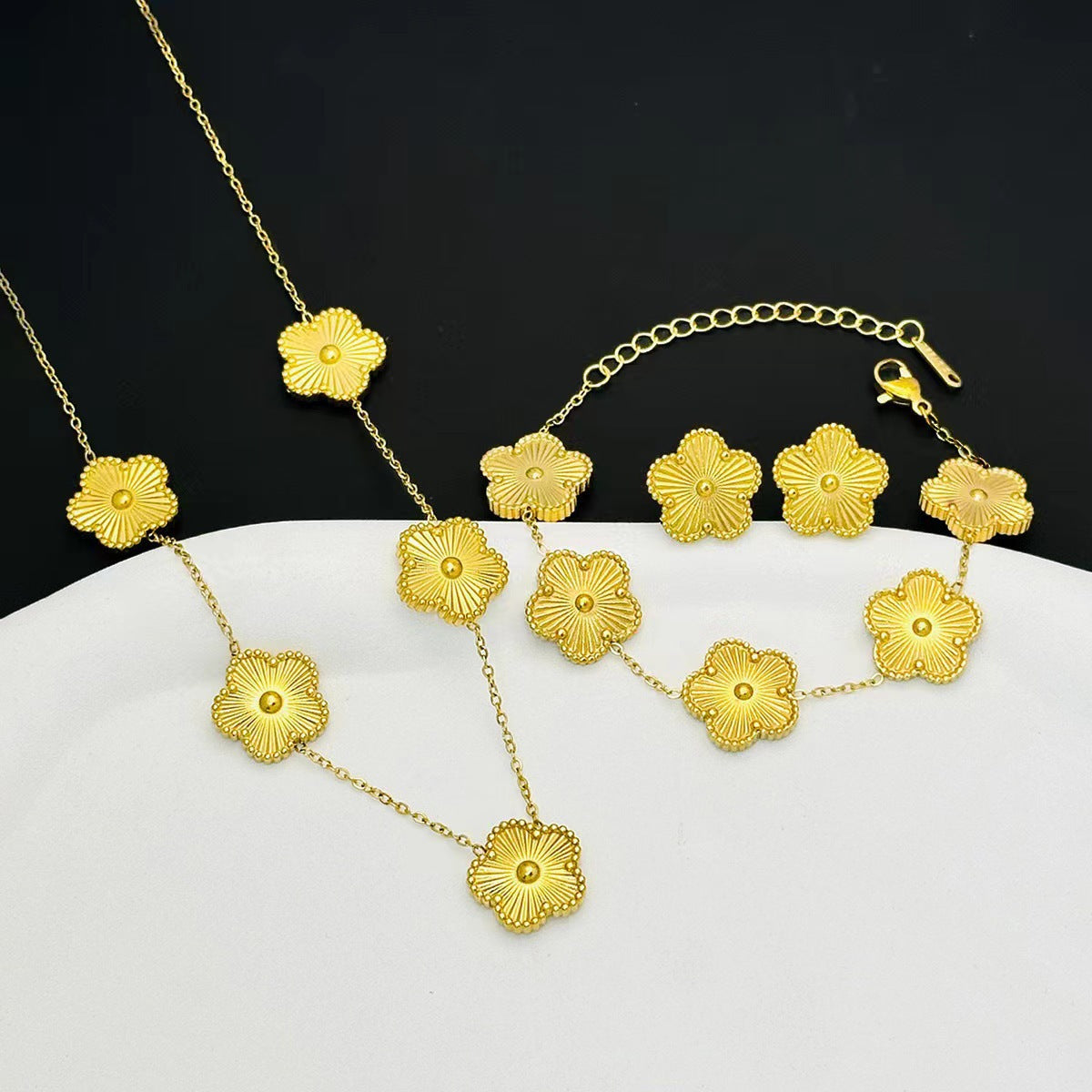 Women's Fashion Plum Ear Three-piece Stainless Steel Gold Laser Necklaces