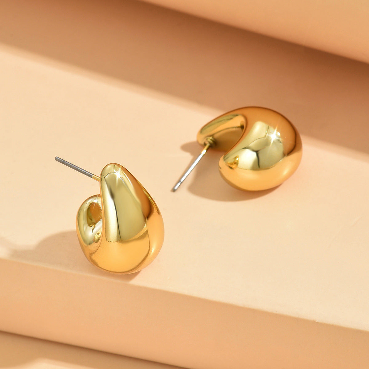 Women's Design Sense Chubby Water Drop Simple Earrings
