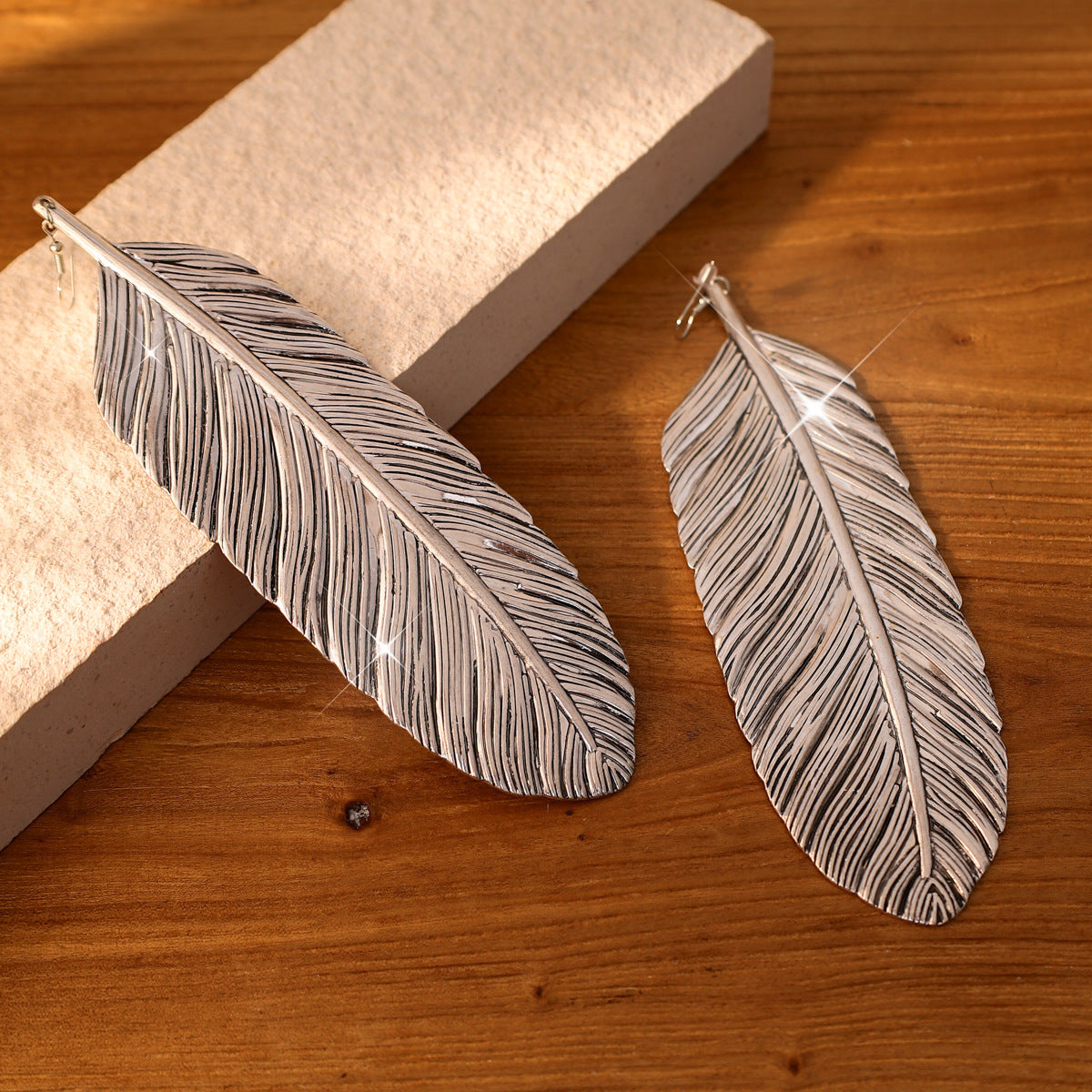 Exaggerated Long Metal Feather Textured Niche Earrings