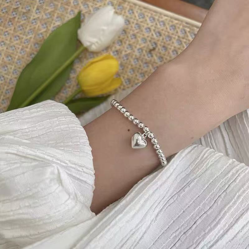 Women's Exquisite Sterling Sier Snake Bones Chain Ball Stitching Asymmetric Light Bracelet